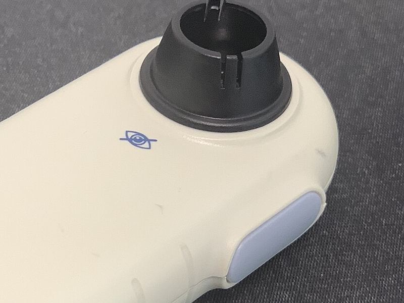 Hand-held dermatoscope used to examine skin