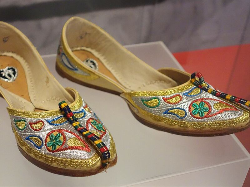 A pair of embroidered juttis with silver and gold thread